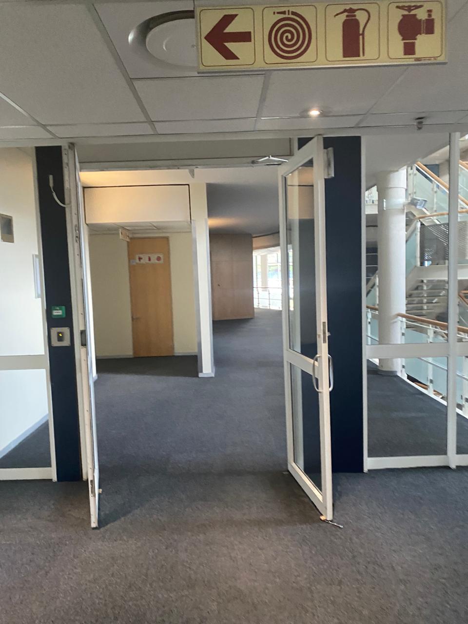 Interior corridor with aluminium and glass doors